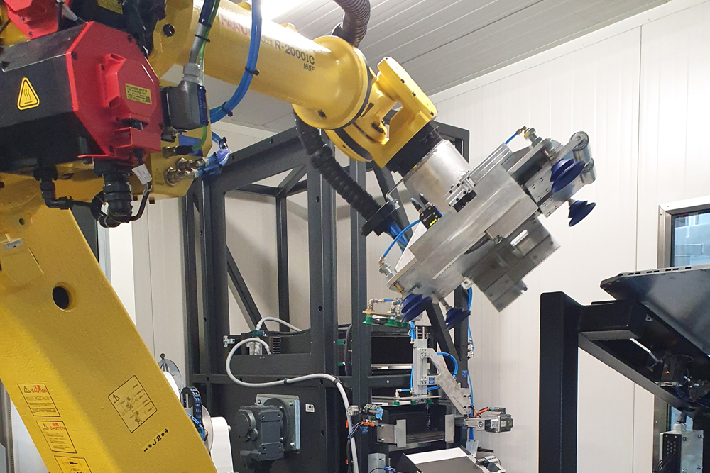 Automated leak test line for battery trays Automated leak test line for battery trays